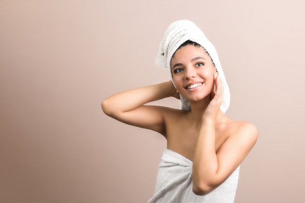 brunette girl dressed with a towel