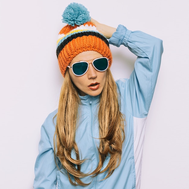 Brunette Pom pom hat and stylish sunglasses Snowboard Warm fashion accessories