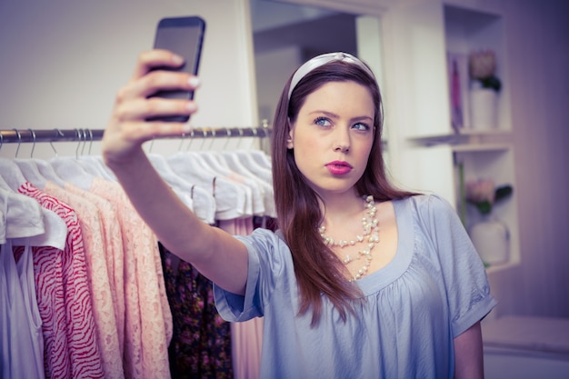 Brunette taking a selfie 