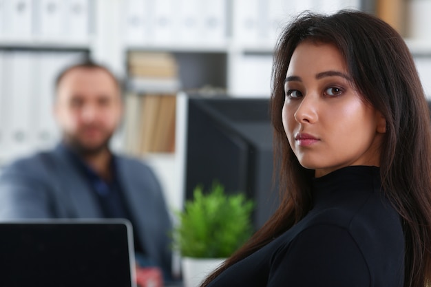 brunette woman in a meeting