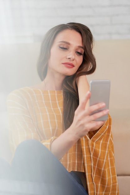 Brunette Woman Taking Selfie On The Phone