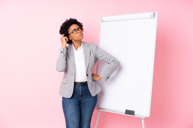 brunette woman with whiteboard