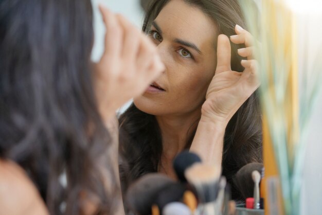 Brunette woman worried about her hair