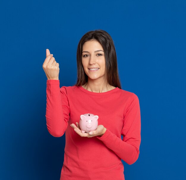 Brunette young woman wearing a red T-shirt