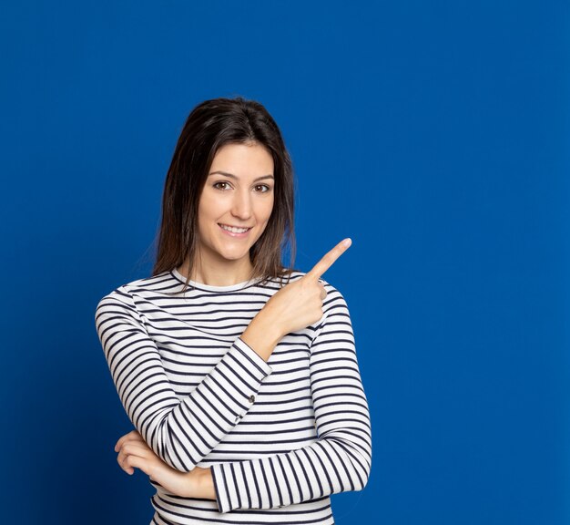 Brunette young woman wearing a striped T-shirt