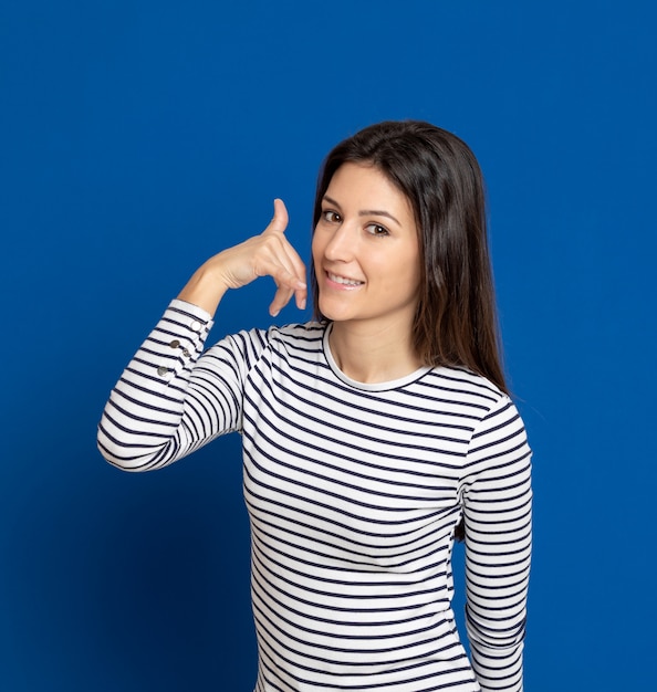 Brunette young woman wearing a striped t-shirt