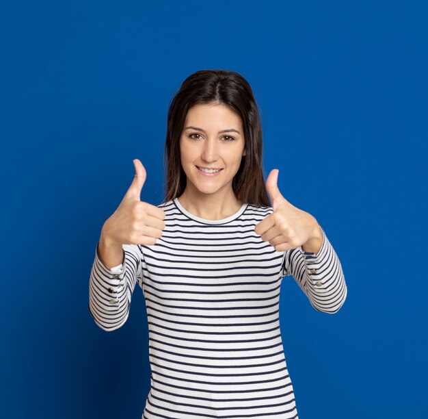 Brunette young woman wearing a striped T-shirt