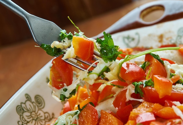 Bruschetta Chicken Bake, perfectly balanced bite of tomatoes, garlic, chicken and mozzarella