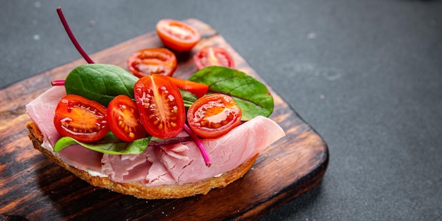 bruschetta ham sandwich tomato lettuce snack meal food snack on the table copy space food