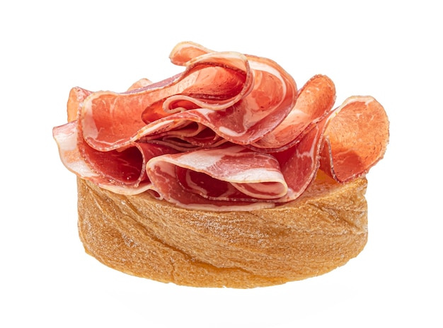 Bruschetta with bacon isolated on white background