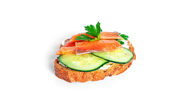 Bruschetta with cream cheese, salmon and vegetables isolated. Toast isolated. Sandwich isolated. Sandwich with salmon and cheese