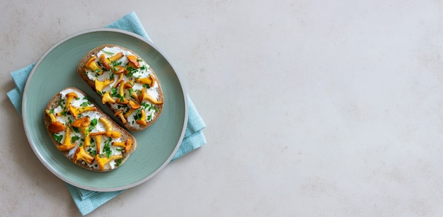 Bruschetta with mushrooms chanterelles and white cheese. Healthy eating. Vegetarian food.