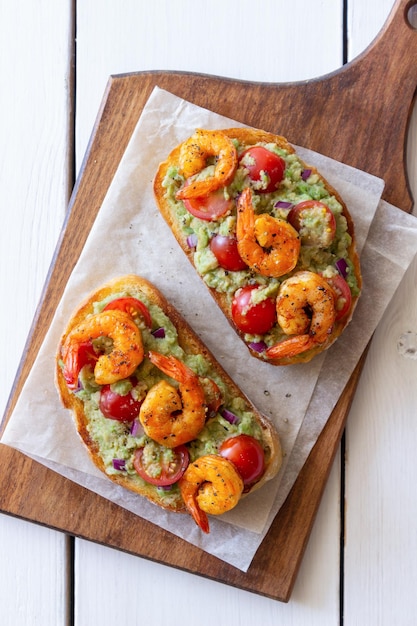 Bruschetta with shrimp guacamole and tomatoes Healthy eating Breakfast