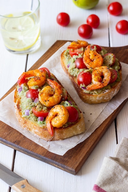 Bruschetta with shrimp guacamole and tomatoes Healthy eating Breakfast