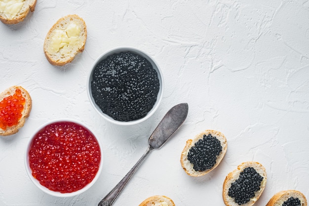 Bruschettas with butter red and black caviar