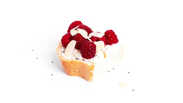 Bruschettas with cottage cheese and raspberries isolated