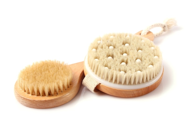 Brush for dry massage on a white background isolated