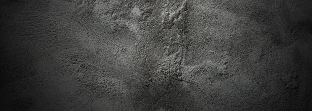 Brush scratches on the wall Scary dark walls slightly light black concrete cement texture for background