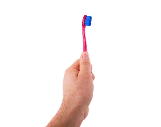 Brush for toothpaste at in the man hand