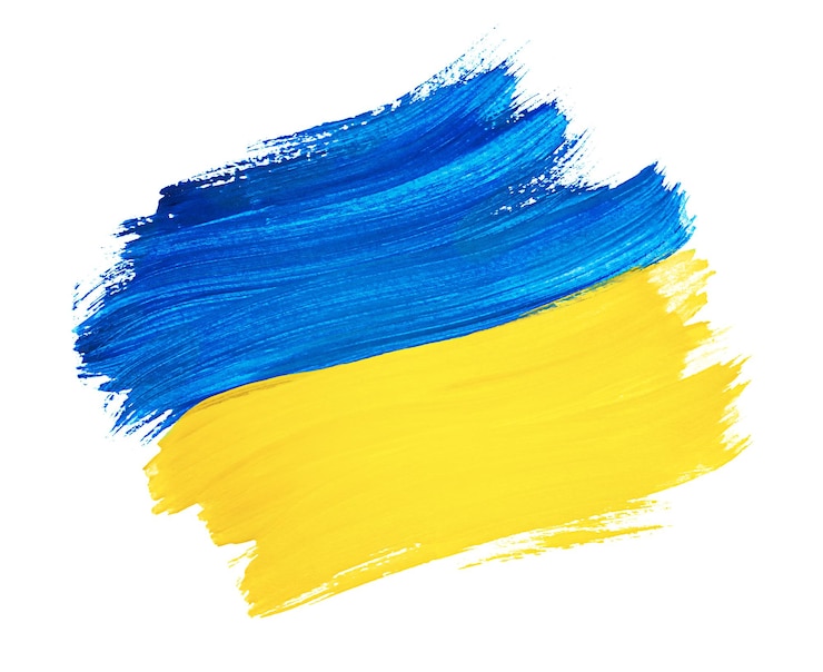Фотография нарисованный кистью украинский флаг на белом изолированном фоне