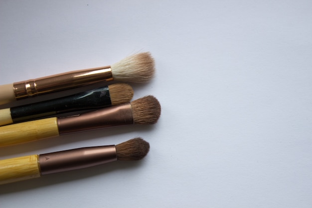 Brushes for applying makeup on a white background