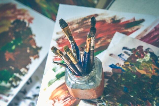 Brushes for drawing stand in a glass with a bristle