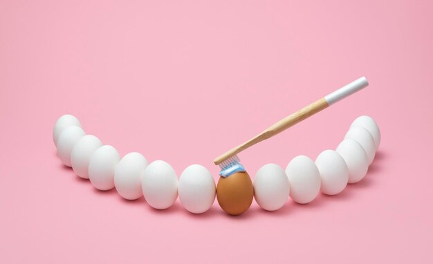 Brushing teeth concept Oral hygiene using wooden toothbrush