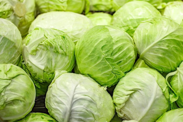 Brussels sprouts are stacked many pieces on market selective focus