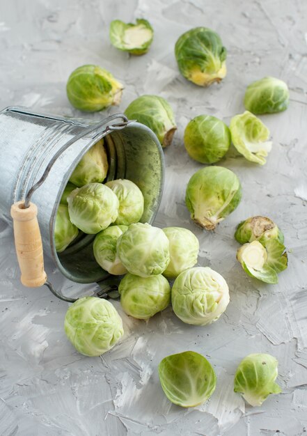 Brussels sprouts  in a bucket on a table close up