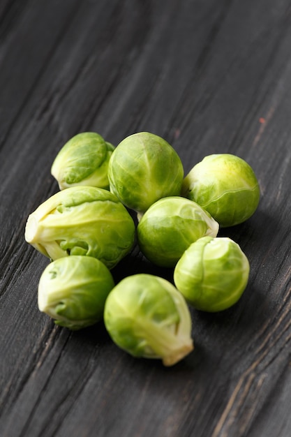 Brussels sprouts on a dark wooden background