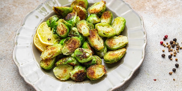 Brussels sprouts fried vegetable healthy meal food snack diet on the table copy space food