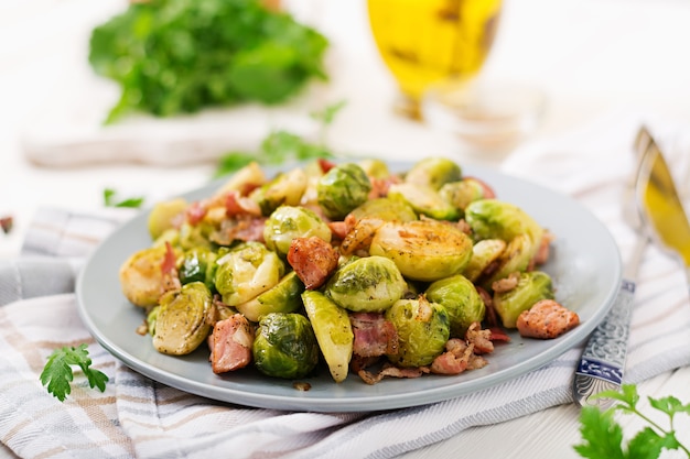 Brussels sprouts. Roasted Brussels sprouts with bacon. Delicious lunch.