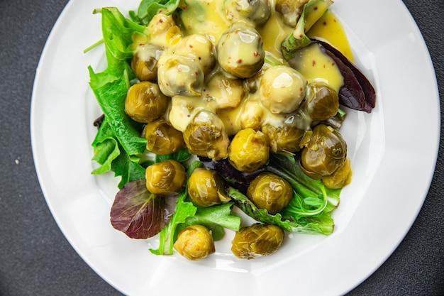 Брюссельская капуста соус горчица овощи здоровая еда еда закуска на столе копировать космическую еду