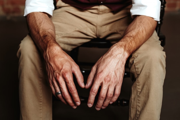 Brutal man`s hands close-up