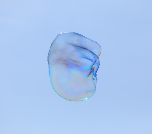 bubble blower on blue sky background