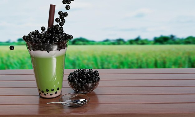 Bubble milk green tea in a clear glass and brown straws placed on a wooden table and blur the background of the rice field 3D rendering