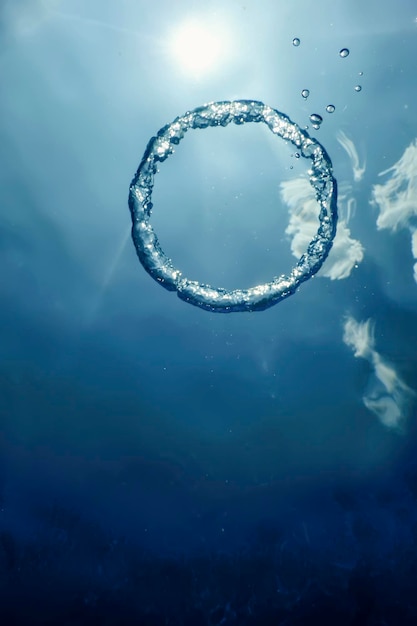 Bubble Ring Underwater ascends towards the Sun.