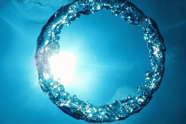 Bubble ring underwater ascends towards the sun