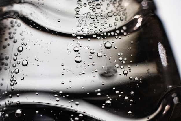 Bubbles in water on a gray background