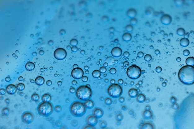 Bubbles in water with blue background