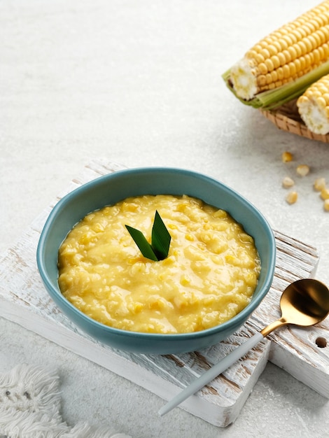 Bubur jagung manis or sweet corn porridge Indonesian traditional dessert Selected focus