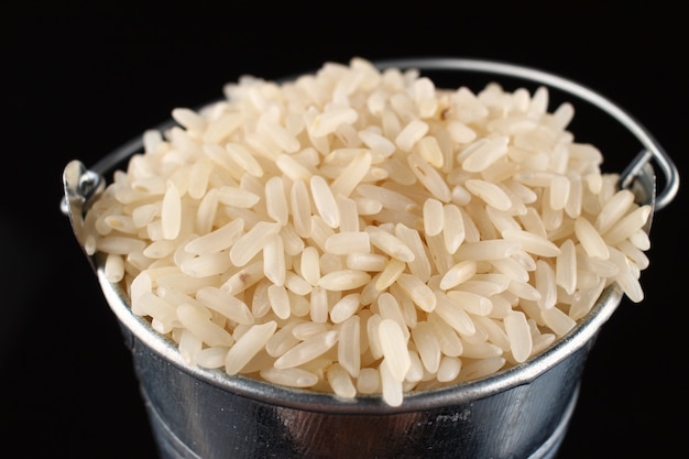 A bucket of rice close up