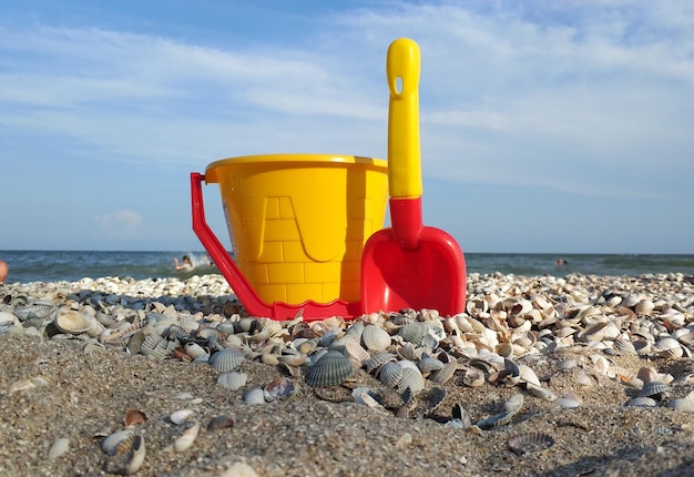 bucket and spade on beach
