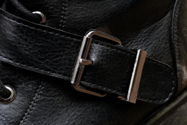 Buckle on a black shoe close up