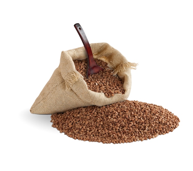 Buckwheat in bag with spoon isolated