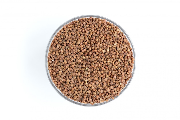 Buckwheat in bowl isolated top view