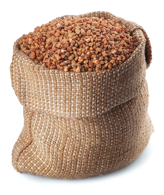 buckwheat in burlap bag isolated on white background