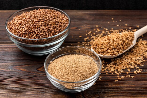 Buckwheat flakes on wooden planks