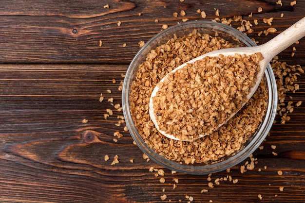 Buckwheat flakes on wooden planks