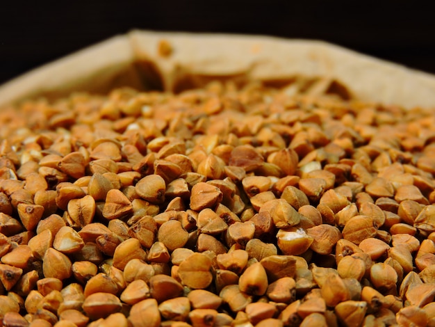 Buckwheat groats in a paper bag.